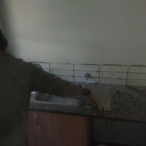 Apartment Interior Repaint & Kitchen Splashback - Setting out the new splashback tiles