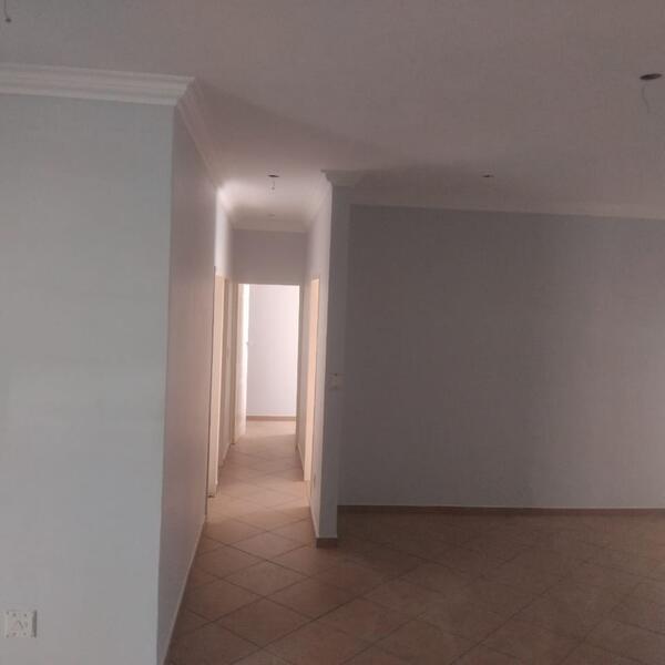 Apartment Interior Repaint & Kitchen Splashback - Freshly painted passage and dining area