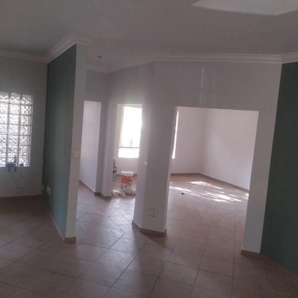 Apartment Interior Repaint & Kitchen Splashback - Bright, open-plan living space complete