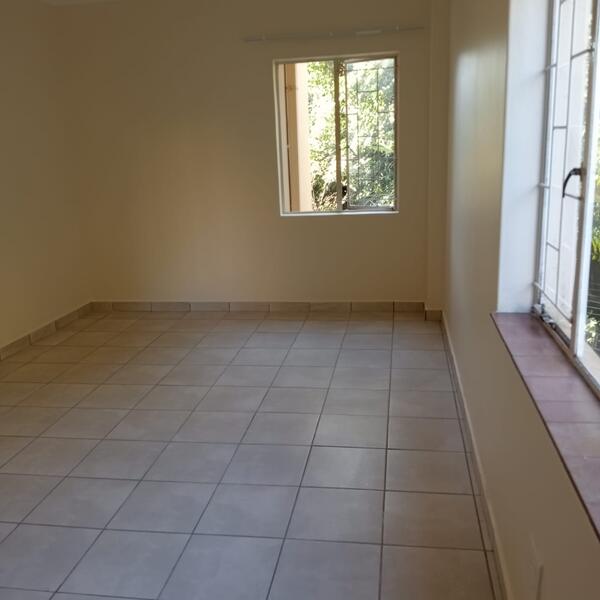 Interior Bedroom Repaints - Second bedroom with fresh walls and ceiling