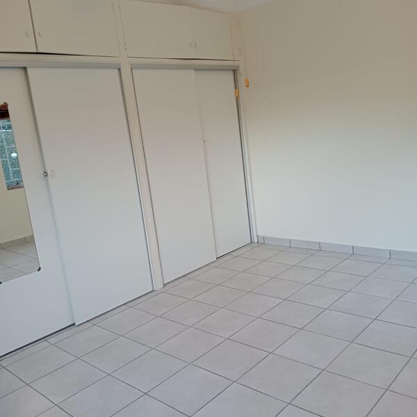Interior Bedroom Repaints - Built-in cupboards painted to match