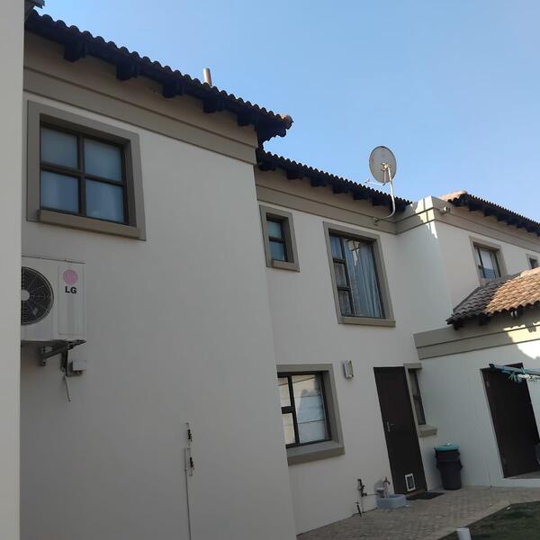 Family Home & Boundary Wall Repaint - Completed side elevation