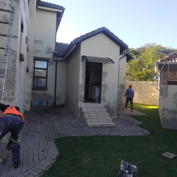Modern Home Exterior Makeover - Crack repairs to the entrance and garden walls