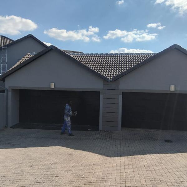 Modern Home Exterior Makeover - Finishing touches to the garage façade