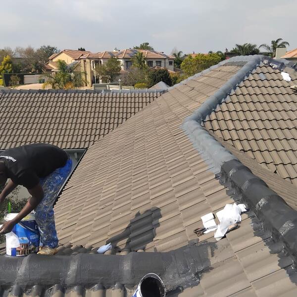 Roof Tile Restoration - Sealing ridges and preparing the tiles