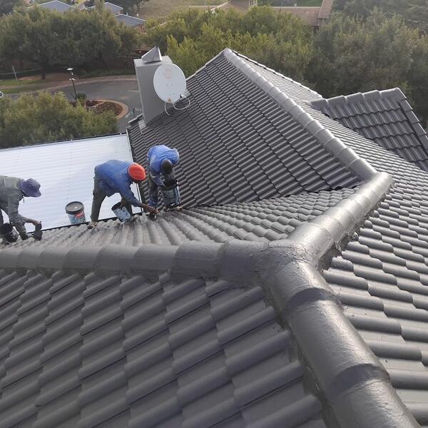 Roof Tile Restoration - Recoating the ridge caps