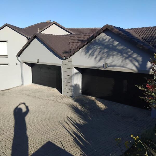 Roof Tile Restoration - Finished roof and garage from the street