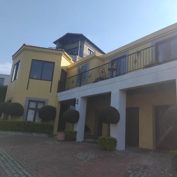 Townhouse Complex Exterior - Warm ochre finish across the complex